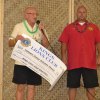 Senior Center President Richard Rea is presented a check from Lion Joe Arruda.